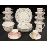 An early 20th century Wellington China tea set for six; a Royal Crown Derby coffee cup and saucer;