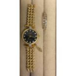 An unmarked gold eternity ring, clear stones, size M, 2.2g; a lady's Rotary watch, black dial,