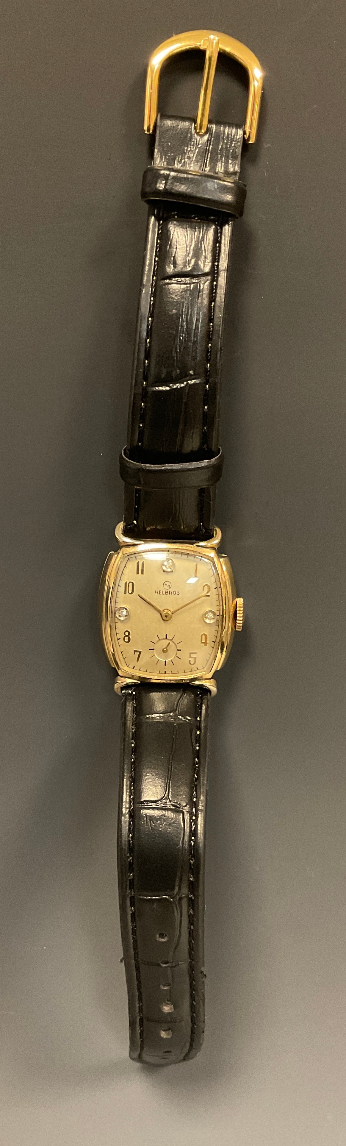 Helbros Watch Co - a 1940s Tonneau cased wristwatch, 23mm wide case, diamond accented dial, Arabic