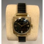 Longines Wittnauer - a 1960s rolled gold cased wristwatch, textured square 28mm case, black dial,