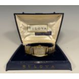 Bulova - a vintage gentleman's 10k rolled gold wristwatch, c. 1940/50, the shaped cushion case