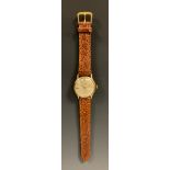 Garrard - a 1970s 9ct gold cased wristwatch, silvered dial, block baton markers, centre seconds,