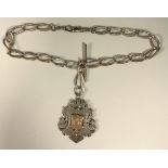 A Victorian silver Albert Chain, Tbar, twisting links, clip terminals, large silver suspension