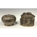 A Burmese pierced and repoussé decorated canted rectangular Ramayana silver box, decorated with