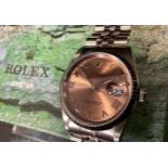 A Rolex Oyster Perpetual Datejust stainless steel wristwatch, salmon dial, the dial 30mm diameter,