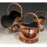 An 18th/19th century copper coal scuttle, swing handle, others, largest 46cm x 52cm x 31cm (3)