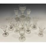 A group of Georgian and Regency glasses - three similar William IV port glasses, bowls with slightly