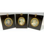 A family group of three 19th century portrait miniatures, Mr J Arnold, Mrs J Arnold and their