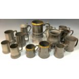 English Pewter - a graduated set of three Victorian Pewter tankards, Quart, Pint, and 1/2 pint,