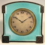 An Art Deco silver and guilloche enamel easel strut timepiece, 5cm silvered clock dial inscribed