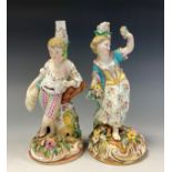 A pair of English porcelain figures in the Derby style, formerly candlestick, painted marks in blue,