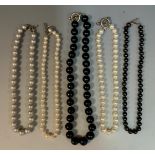 A single strand cultured black pearl necklace, the irregular pearls approx approx 11mm diameter,