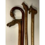 Walking sticks - two folk art walking sticks, bird and horses head terminals; others, one carved