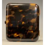 A 9ct gold mounted faux tortoiseshell cigarette case, stamped 9k to hinges, 8cm x 7cm.