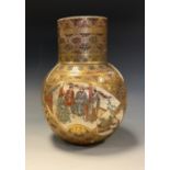 A Japanese Satsuma pottery vase, ridge shouldered globular form, decorated with three panels of