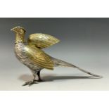 A Continental silver and silver gilt novelty pepperette or casting bottle, as a pheasant, with