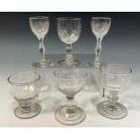 A George III rummer, ogee bowl, knop stem, deep ringed foot, c.1810; another; port wine glass,