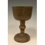 An 18/19th century ecclesiastical turned wooden chalice, banded bowl, painted detailing, 16cm high