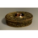 A 19th century Limoges enamelled oval ormolu and gilt metal trinket box, the hinged lid centred with