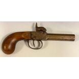 An early 19th century percussion pocket pistol, hexagonal barrel, 18cm long.