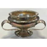 An Edwardian silver Art Nouveau three-handled ogee shaped pedestal bowl, everted rim above three