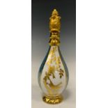 A Lynton porcelain scent bottle, quartered in turquoise, white and gilt with birds amongst