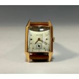 A Zenith 18ct gold cased wristwatch, 25mm wide case, silvered dial, arrow and dot baton markers,