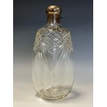 A George V silver mounted square cut glass spirit decanter, hinged domed bayonet cap, star-cut base,