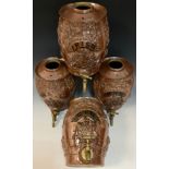 A set of four Brampton stoneware spirit barrels, each relief sprigged with Knights and Lion, grape