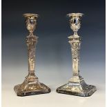A pair of Edwardian Adam Revival silver candlesticks, embossed in the Neo-Classical taste, 21cm