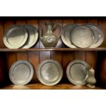 A set of six early 19th century pewter plates, part textured with spotted finish, 24.5cm diameter,