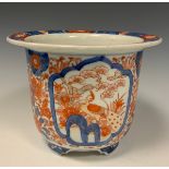 A 20th century Japanese Imari planter, decorated with traditional Peacock panels, floral and foliage