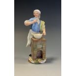 A Meissen figure, of a cook, 15cm high, incised marks, painted blue crossed swords