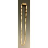A 14ct gold mounted pearl necklace, 47cm long, marked 585