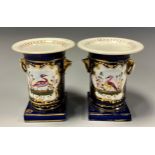 A pair of English porcelain spill holders, probably Chamberlains, painted with Birds and flowers