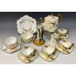 Wileman and Company 'Gold and silver thorns' pattern,no.3846, tea service for four comprised of a