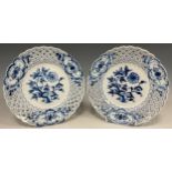 A pair of 19th century Meissen side plates, onion pattern in blue and white, pierced ‘woven’ border,