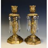 A pair of 19th century gilt bronze figural candle lustres, each cast as a pastoral beauty