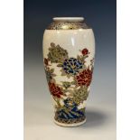 A Japanese satsuma ovoid vase, painted with flowers and picked out in gilt, 16cm high, character