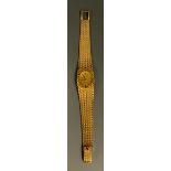 A Tissot lady's 18ct gold cased bracelet wristwatch, oval dial, manual wind 2403 movement, serial no