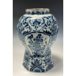 A Delft octagonal vase, painted in tones of blue in the Chinese taste, 28cm high, 18th/19th century