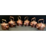 A 19th century copper kettle, swan neck spout, acorn finial, 29cm high, 29.5cm wide, others oval,