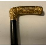 A George V presentation walking stick, gilt floral handle, ebonised shaft, Presented to Mr T Hughes,