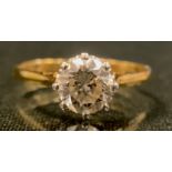 A diamond solitaire ring, round brilliant cut diamond measuring approx 6.9mm x 6.9mm x 4.5mm,