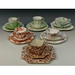 A group of six Wileman and Company tea cup trios including; a 'Dresden flowers' pattern, no.4243,