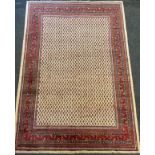 A North East Persian Mir rug / carpet, hand-knotted, large central field with repeating diamond