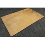A large 19th century elm rectangular country house bread or dairy board, 84cm long, 54cm wide