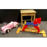 Toys and Juvenilia - A Barbie pink ride-on Baghera toy car; a painted wooden rocking horse; a mid