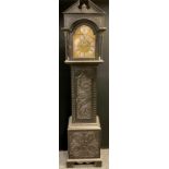 A Victorian carved oak longcase clock case, (later 8-day chiming movement), brass and silvered metal