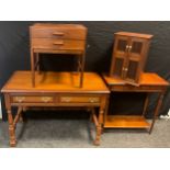 A mahogany cross-banded oak hall table, over-sailing rectangular top, pair of drawers to frieze,